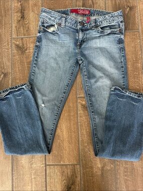 Guess Light Wash Boot Cut Jeans with Subtle Distressing